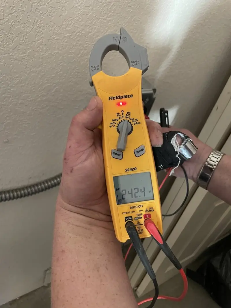 Voltage testing with clamp meter during Electrical Installation Services in Whittier